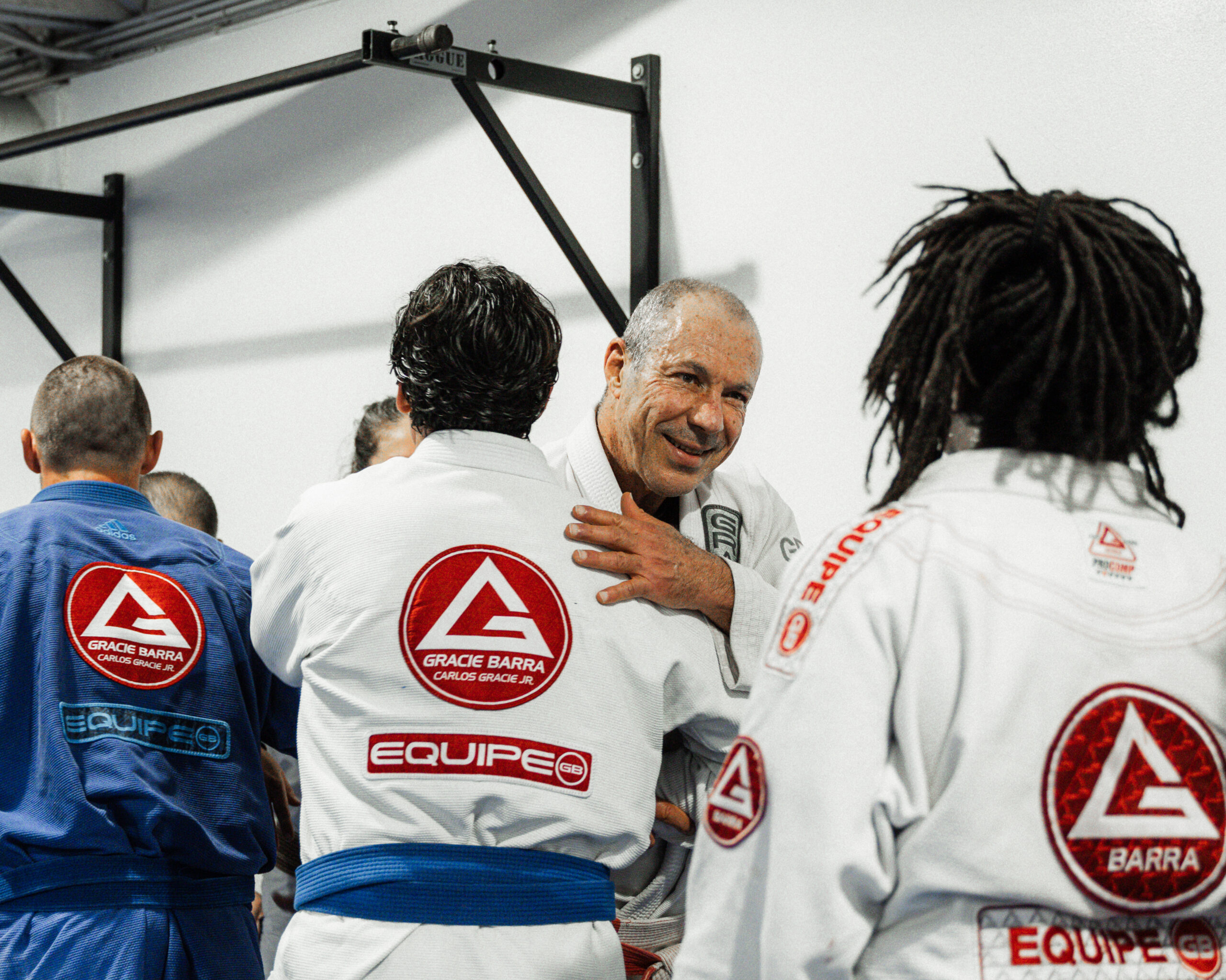 Gracie Barra Newton students practicing Brazilian Jiu-Jitsu techniques during class